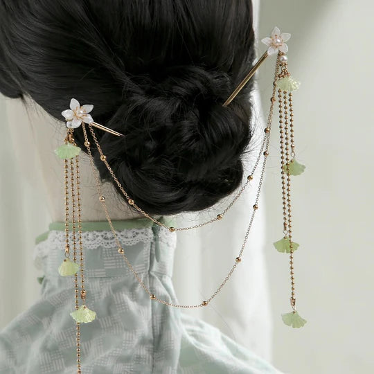 Helena Cheongsam Hairpins - Complete your elegant cheongsam ensemble with these exquisite hairpins. Delicate and intricate designs inspired by classic cheongsam fashion exude grace and sophistication. Perfect for weddings, cultural events, or any special occasion.