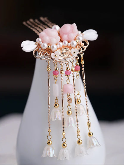 Moon Hanfu Hair Accessories Collection - Elevate your style with our exquisite collection of Traditional Chinese Style hair accessories. From hairpins to tassels, each piece is crafted to enhance your appearance. Discover the perfect adornments to express your unique elegance.