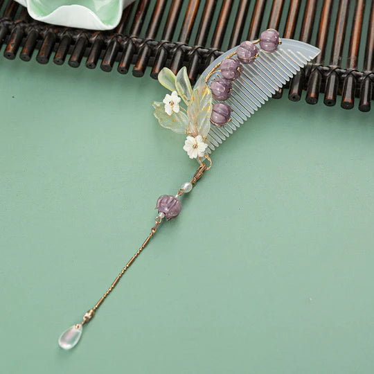 Wisteria Hanfu Hair Comb - Enhance your Hanfu ensemble with the exquisite Wisteria Hanfu Hair Comb. Its meticulously crafted design captures the grace and femininity of wisteria flowers. Add elegance to your hairstyle with this beautiful accessory.