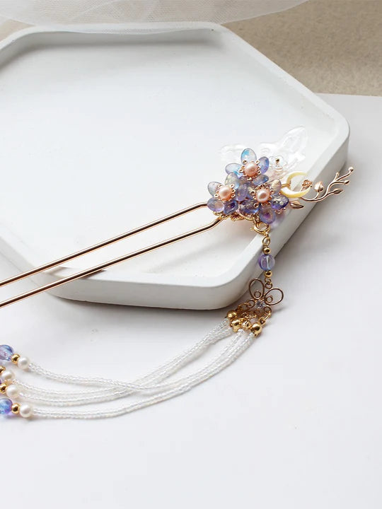 Dolly Hanfu Hairpin - Adorn your hairstyle with the timeless grace of the Dolly Hanfu Hairpin. Its delicate and intricate design adds a touch of elegance and cultural heritage, perfect for traditional events, weddings, or adding a traditional Chinese flair to your hairstyle. Embrace the timeless beauty with this exquisite hairpin.