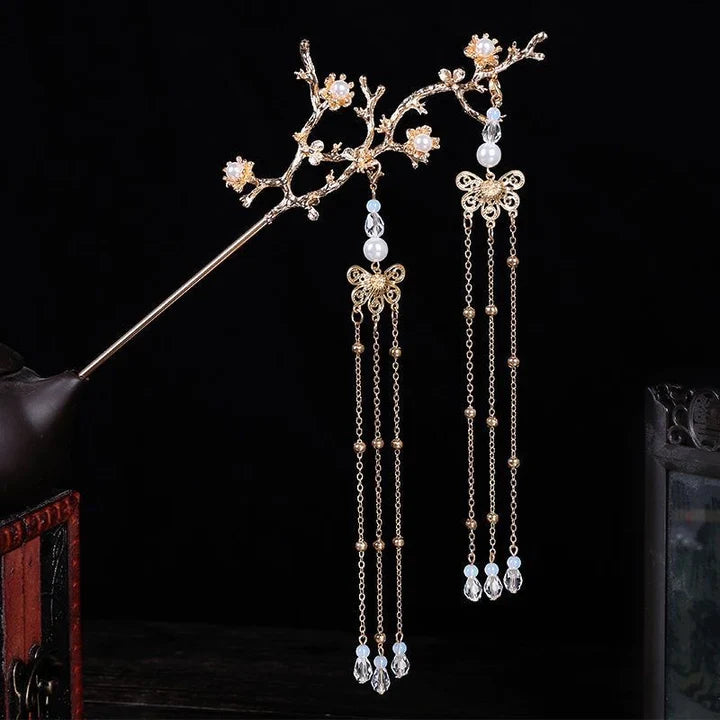 Flower Branch Chinese Hairpin - Adorn your hair with the elegance of the Flower Branch Chinese Hairpin. Its captivating design and intricate floral accents add a touch of traditional charm, perfect for traditional events, weddings, or adding a Chinese-inspired flair to your hairstyle. Embrace the cultural elegance with this exquisite hairpin.