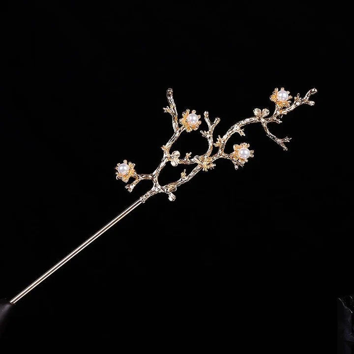 Flower Branch Chinese Hairpin - Adorn your hair with the elegance of the Flower Branch Chinese Hairpin. Its captivating design and intricate floral accents add a touch of traditional charm, perfect for traditional events, weddings, or adding a Chinese-inspired flair to your hairstyle. Embrace the cultural elegance with this exquisite hairpin.