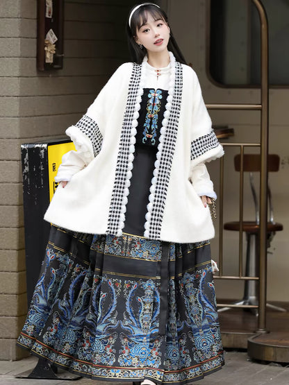 Luan Feng He Ming four-piece hanfu set with a white long beizi and black mamian skirt featuring blue phoenix motifs