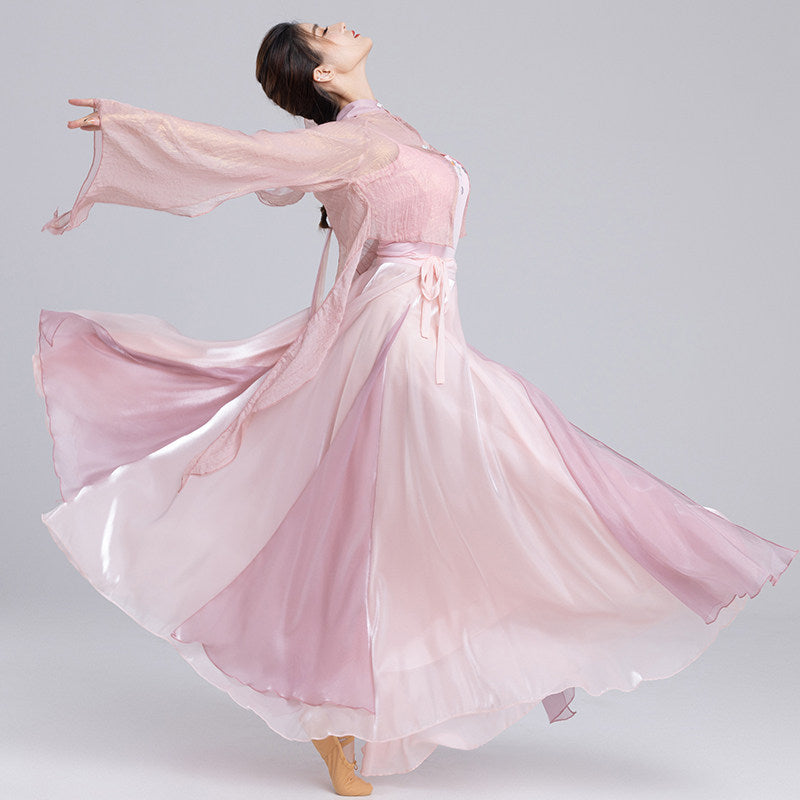 Pink dance outfit with an eighteen-panel skirt spreading into a flowing circular shape