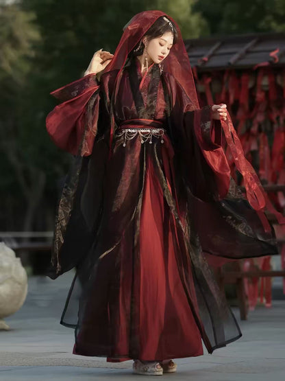 Front view of Yu Ji Tan hanfu with burgundy and black layers, a cross collar and gold-toned decorative details.